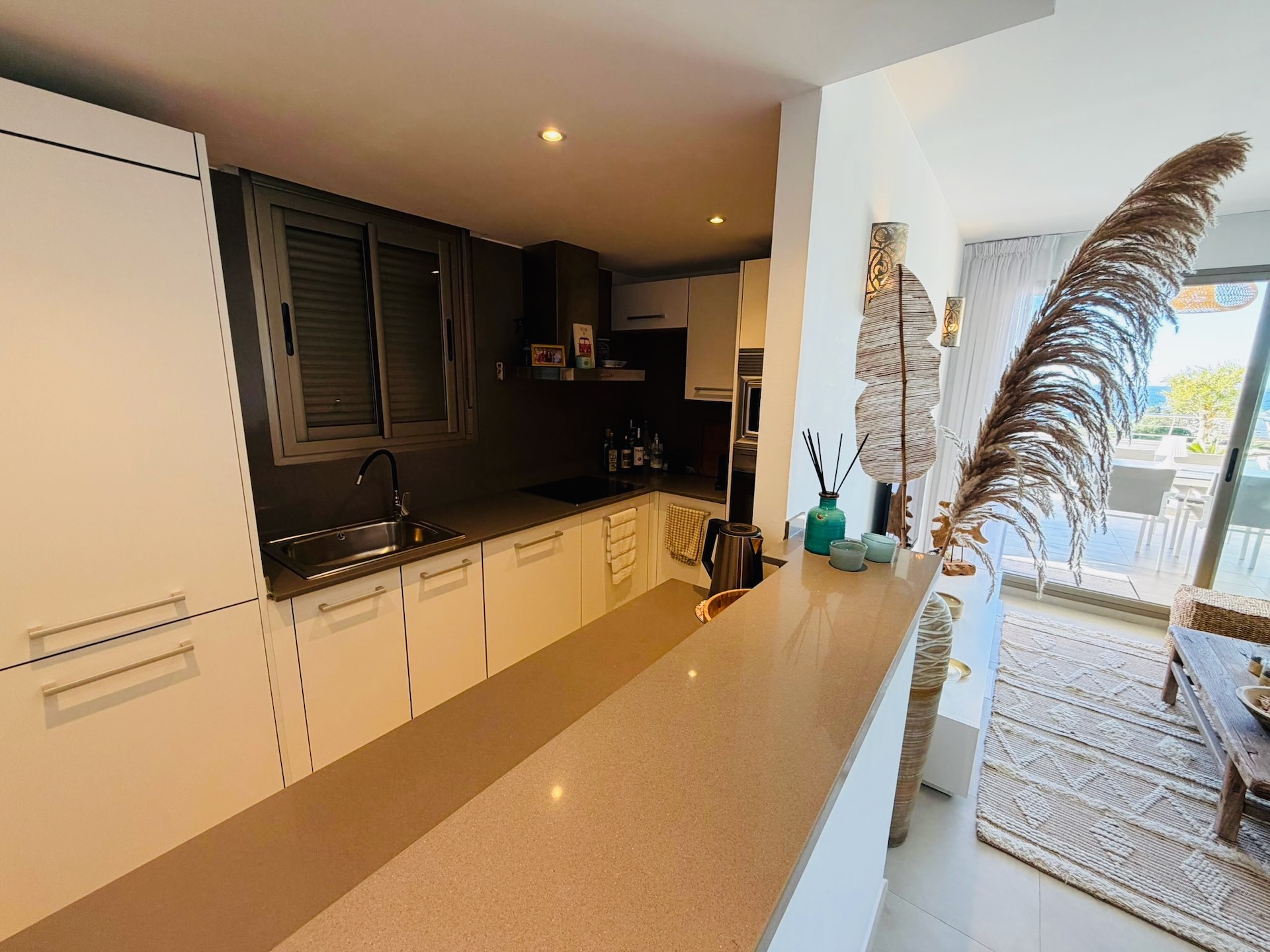 Resa Estates Ibiza Cala Tarida sea views apartment te koop kitchen 3.jpeg